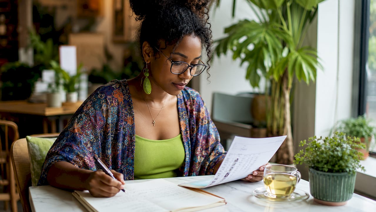 Woman organizing mental health symptom log