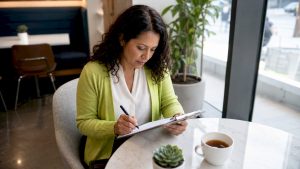 Mental health coordinator reviewing care plan