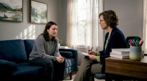 Psychiatrist conducting clinical psychiatric assessment