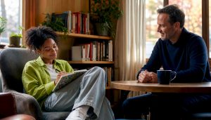 Woman in therapy session with attentive therapist
