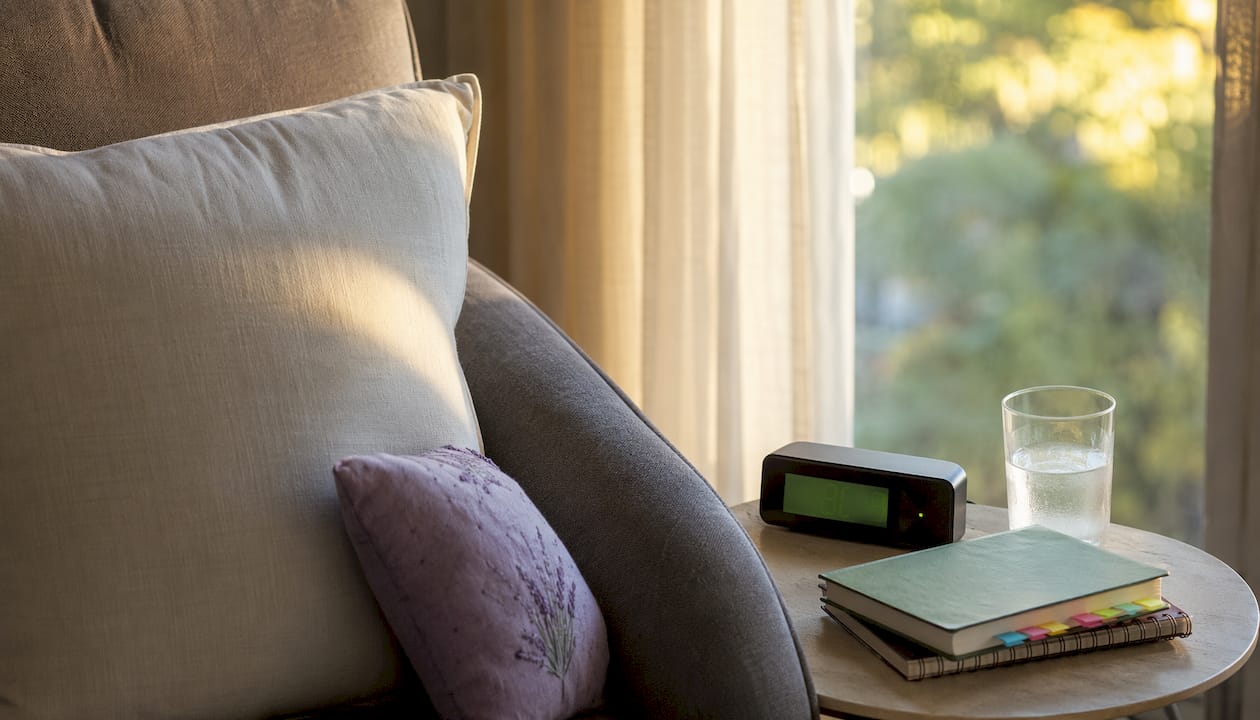 Bedside table with therapy journals and essentials