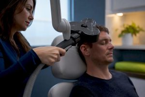 Clinician positioning TMS treatment coil