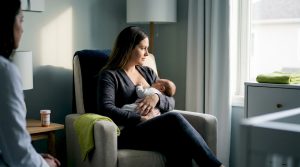 Mother and clinician discussing breastfeeding treatment choices