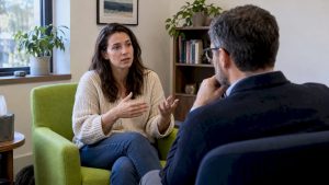 Psychiatrist and patient discussing anxiety symptoms