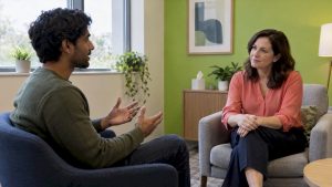 Patient speaking with a psychiatrist during evaluation